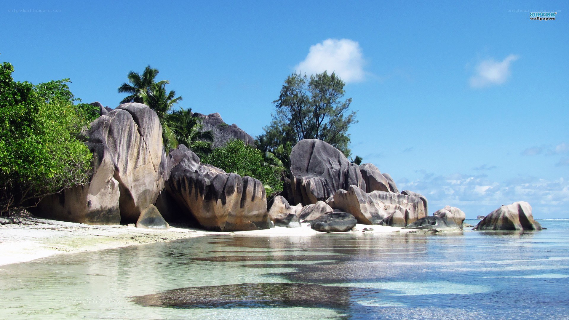 tropical beach with giant rocks
