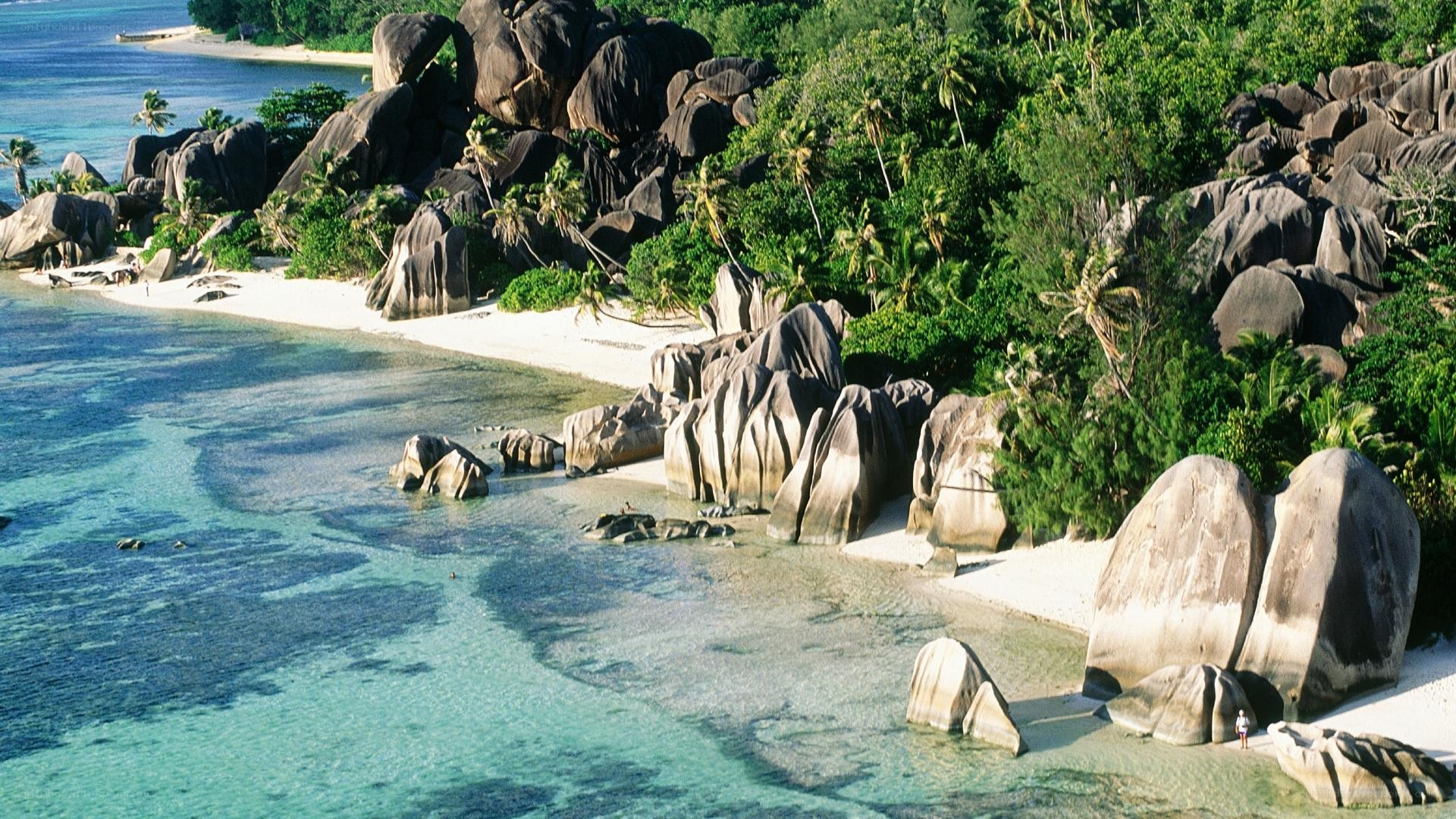 tropical beach with giant rocks