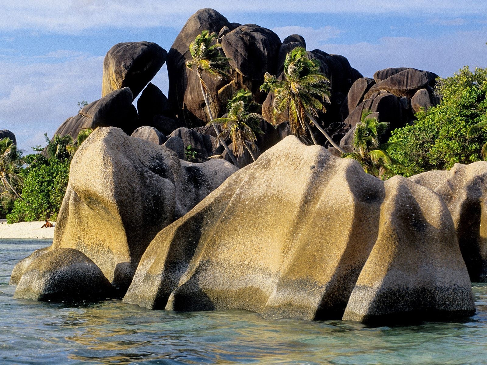 tropical beach with giant rocks