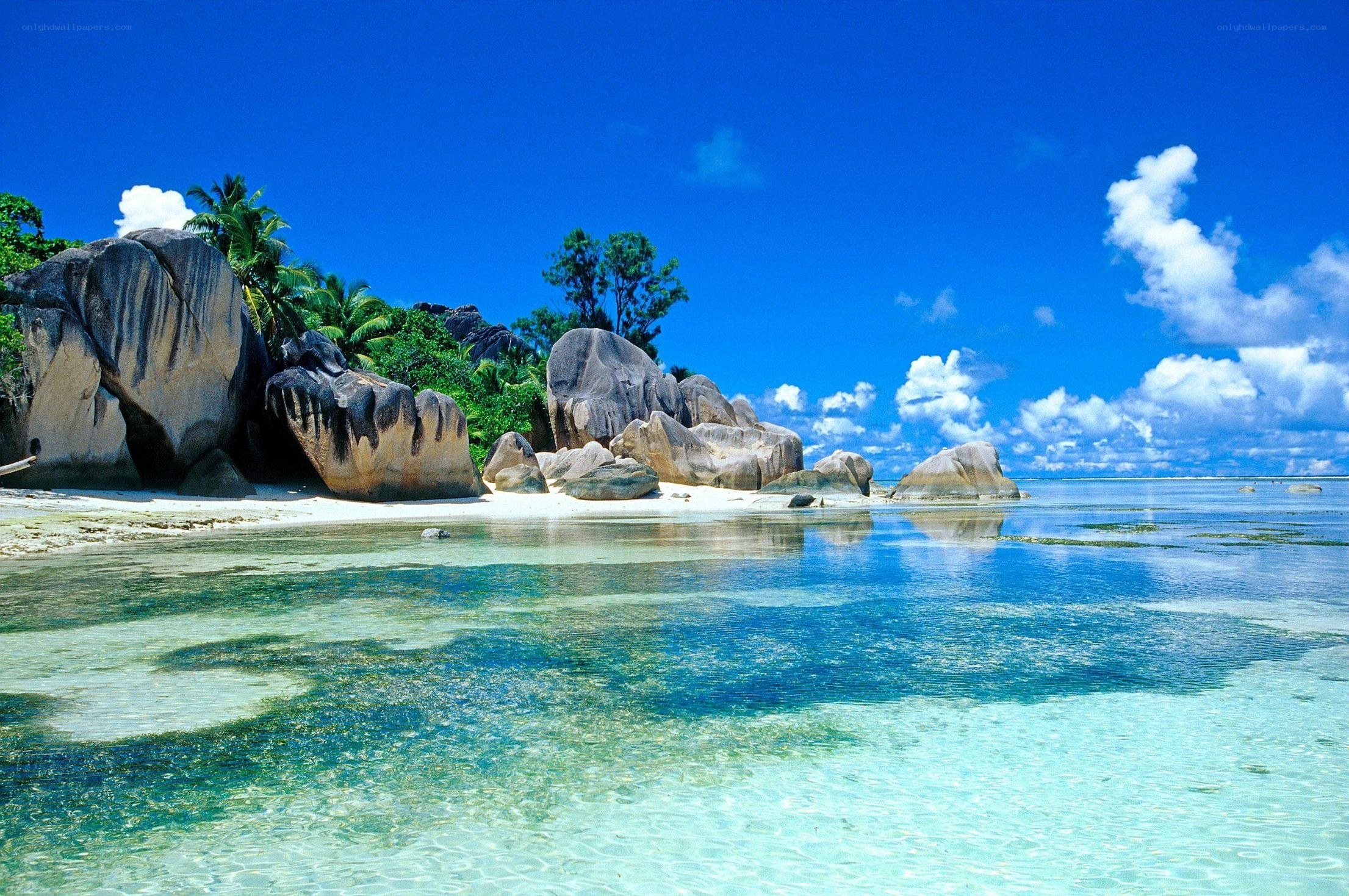 tropical beach with giant rocks