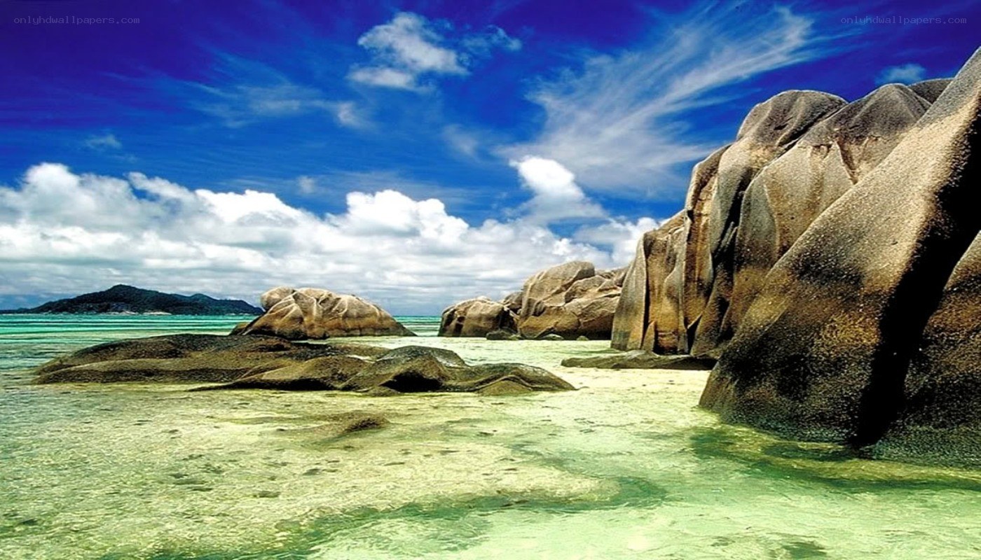 tropical beach with giant rocks