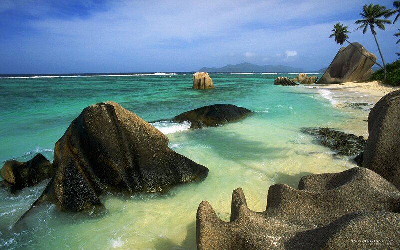 tropical beach with giant rocks