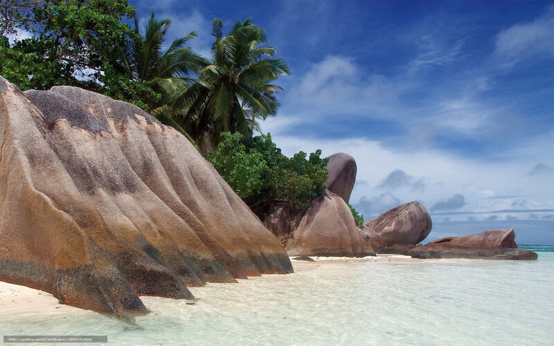 tropical beach with giant rocks
