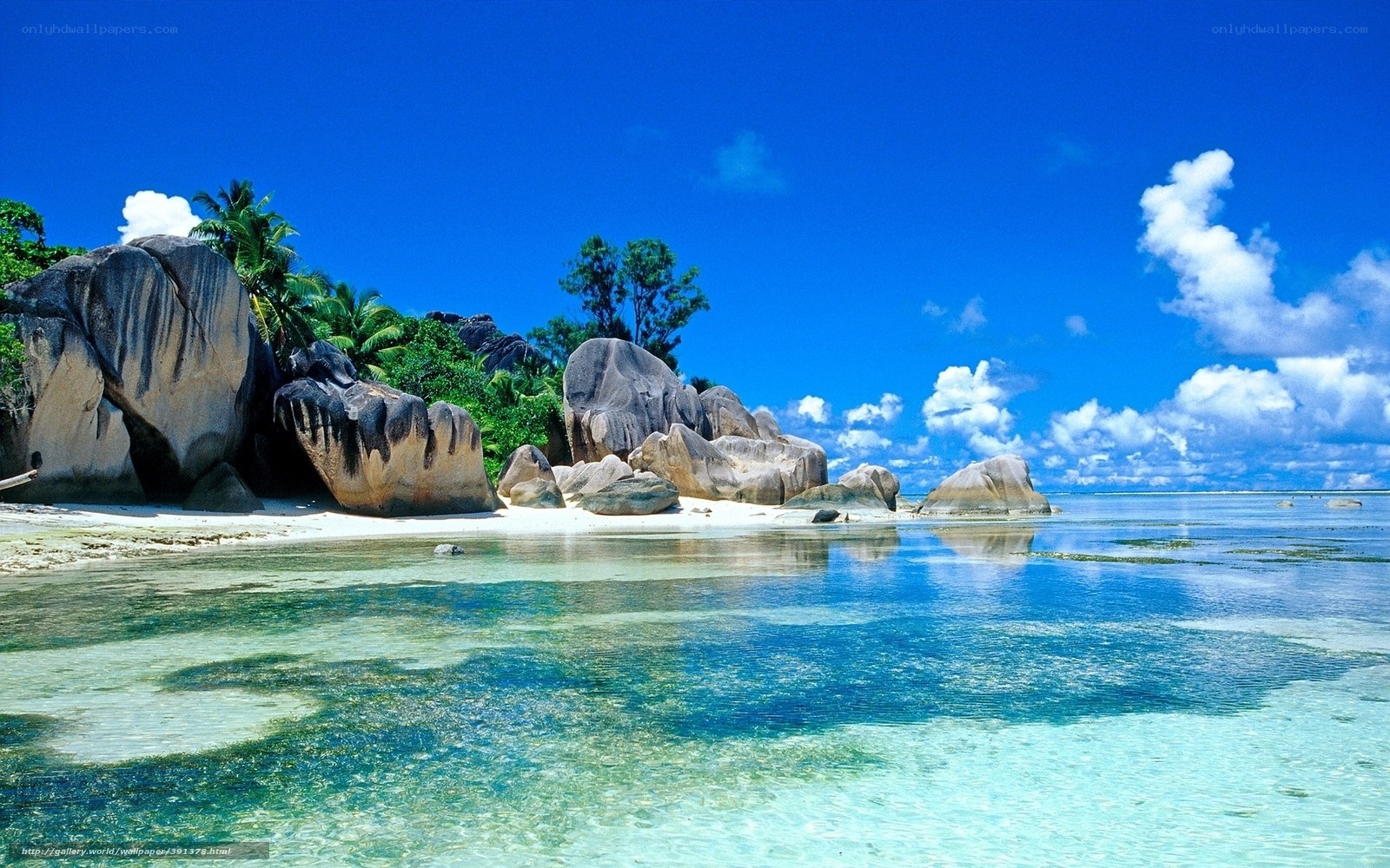 tropical beach with giant rocks