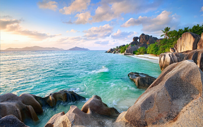 tropical beach with giant rocks