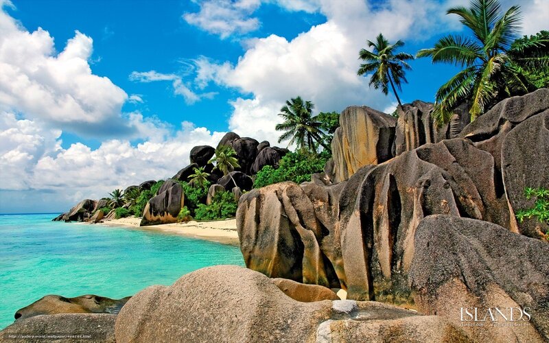 tropical beach with giant rocks