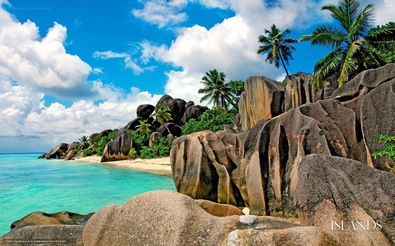tropical beach with giant rocks