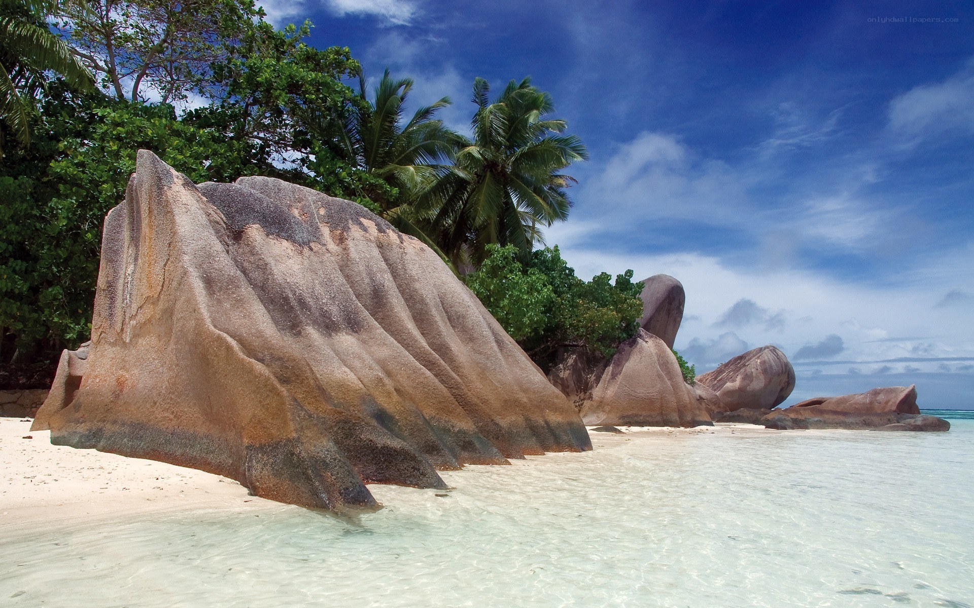tropical beach with giant rocks