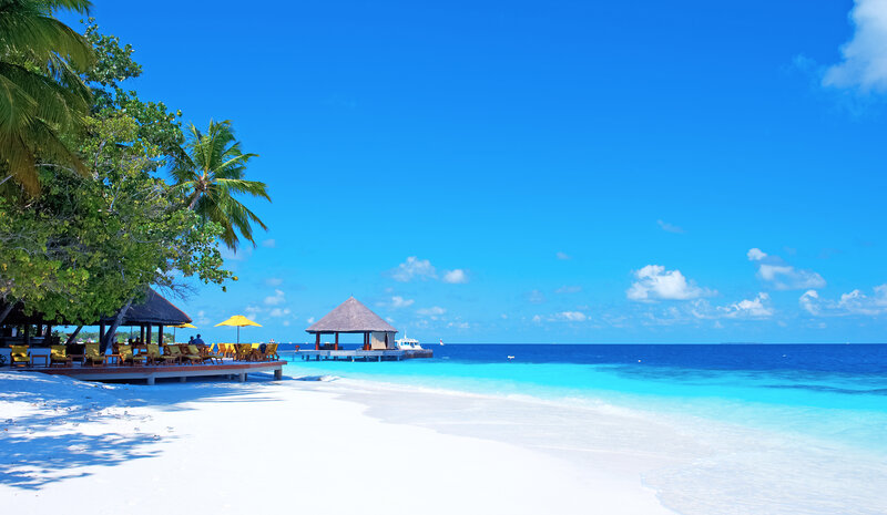 Tropical Beach with Huts — Blue, Serene, Afternoon