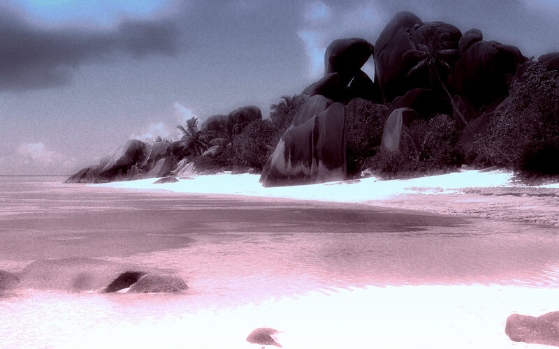 tropical beach with large rocks