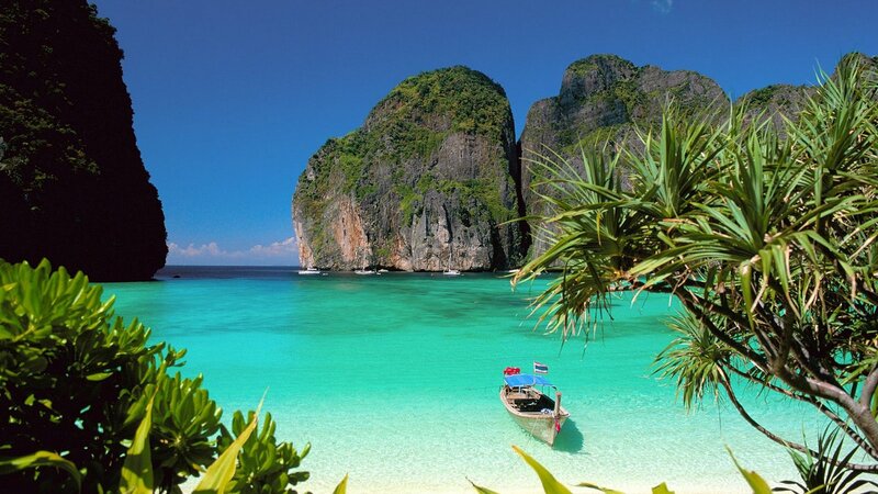 tropical beach with limestone cliffs