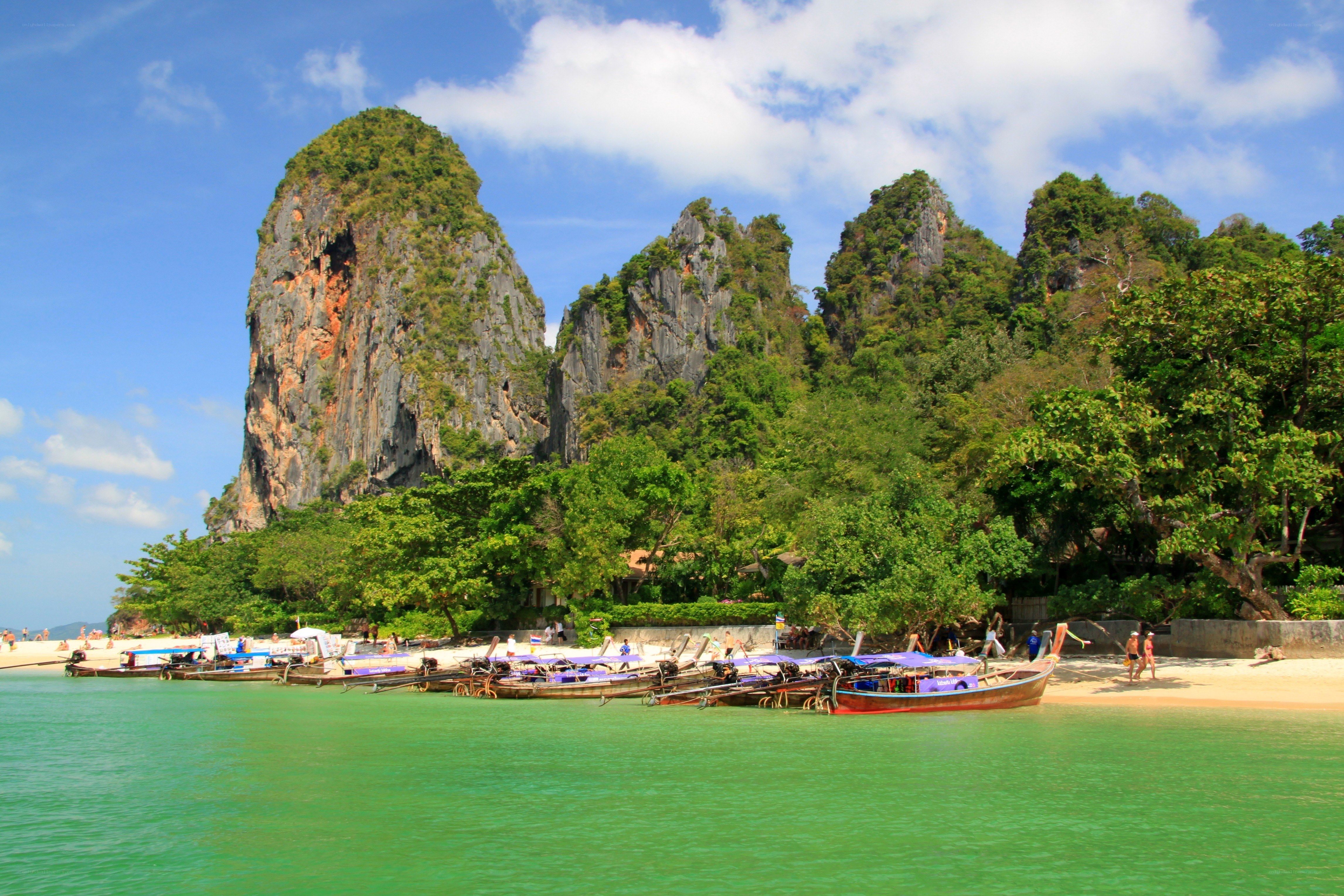 tropical beach with limestone cliffs