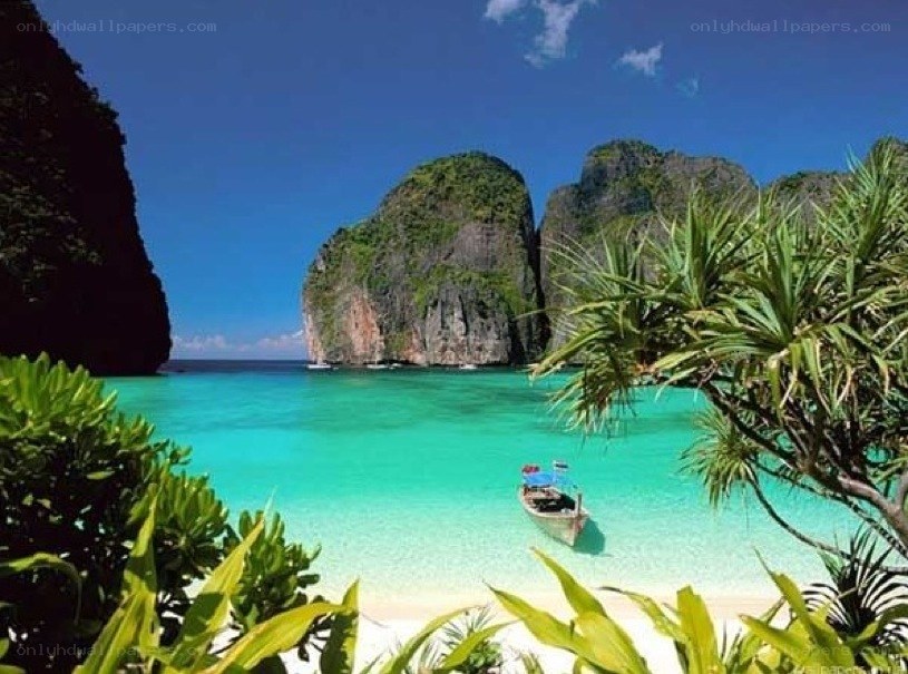 tropical beach with limestone cliffs