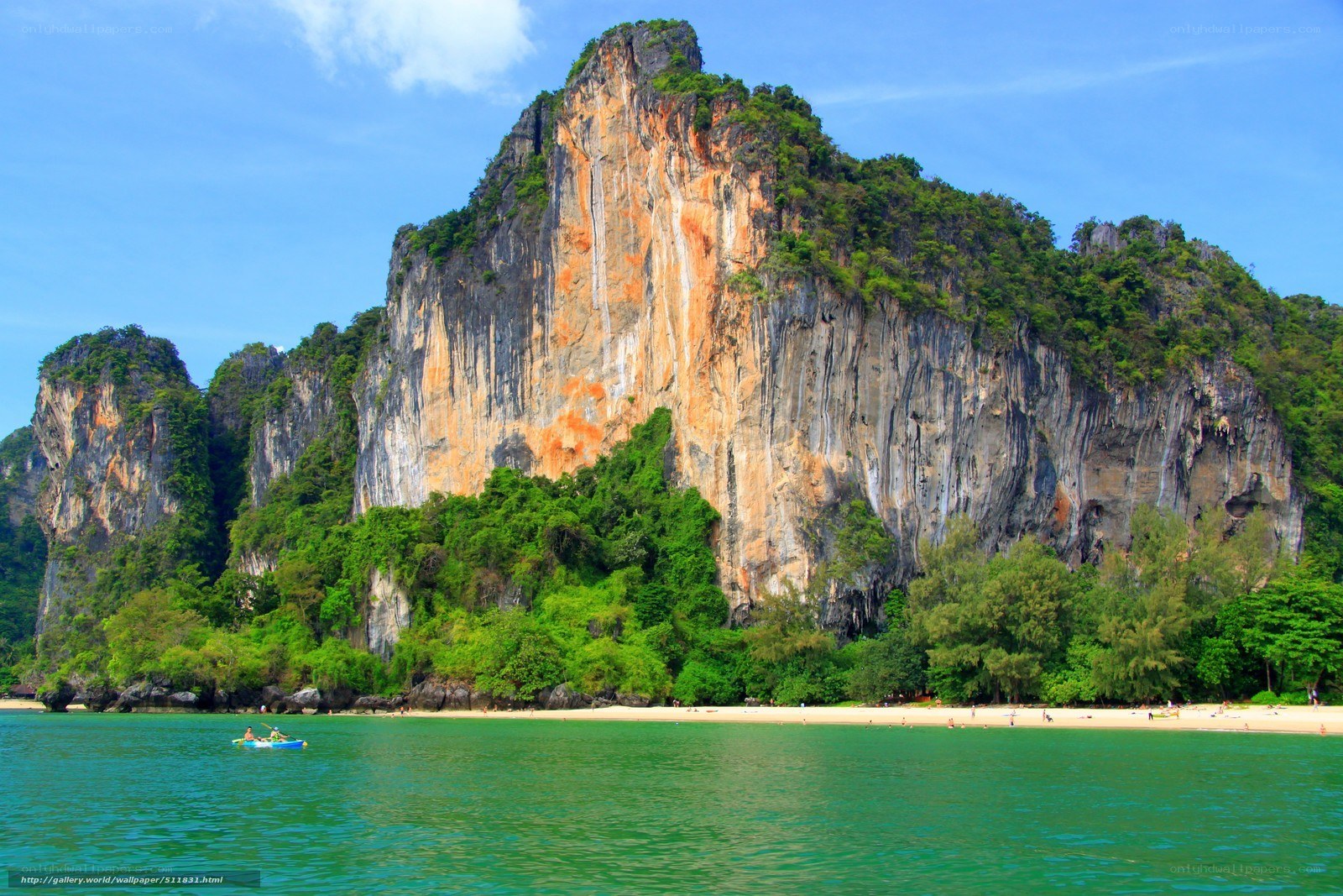 tropical beach with limestone cliffs