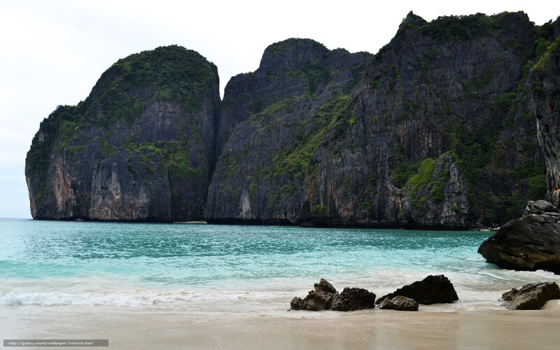 tropical beach with limestone cliffs
