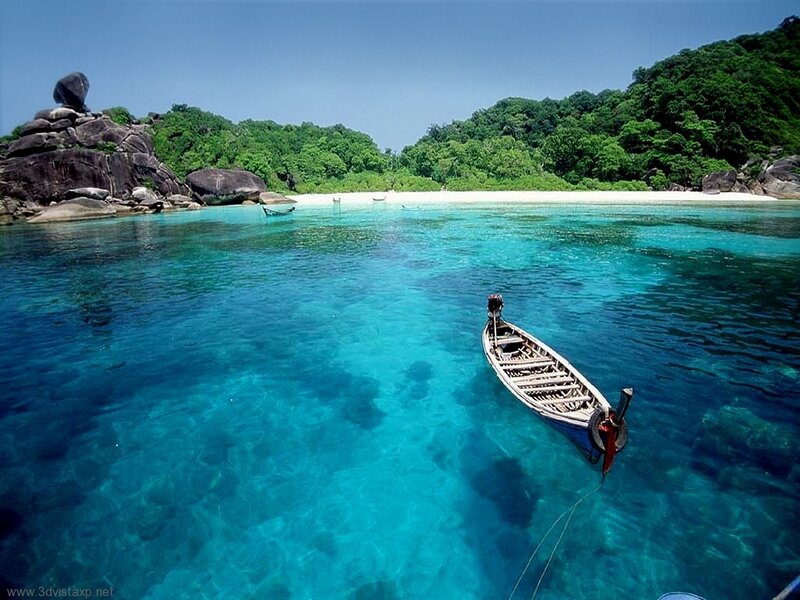 tropical beach with longtail boat