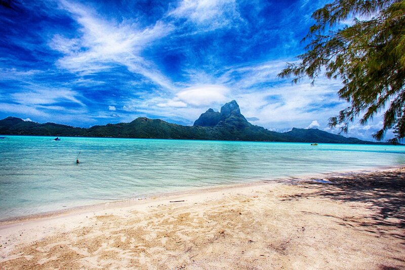 Tropical Beach with Mountains — Blue, Serene, Afternoon, Photograph, Ocean
