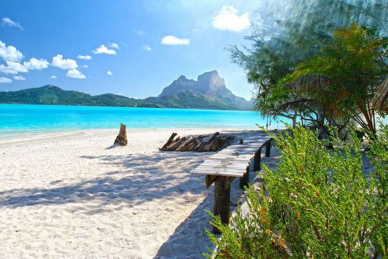 Tropical Beach with Mountains — Blue, Serene, Afternoon