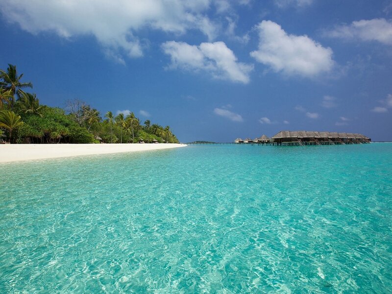 Tropical Beach with Overwater Bungalows — Blue