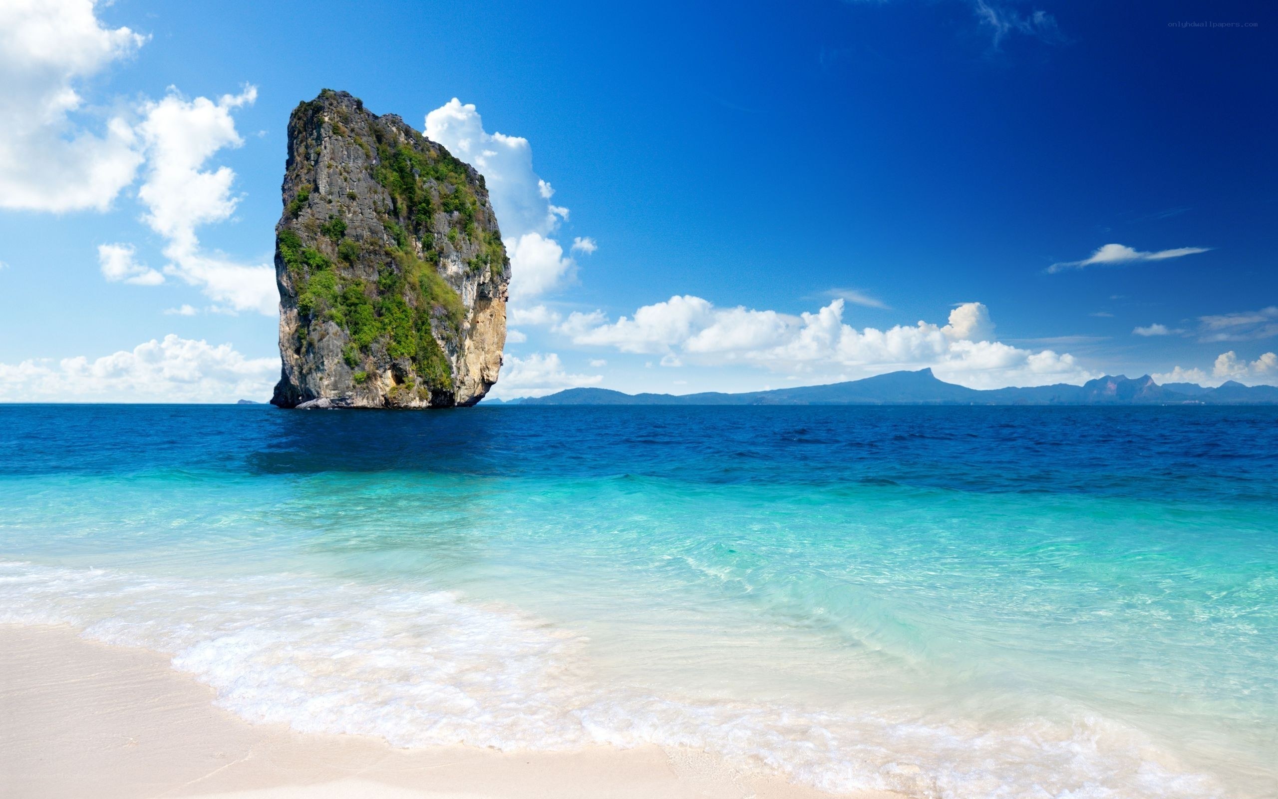 tropical beach with rock formation