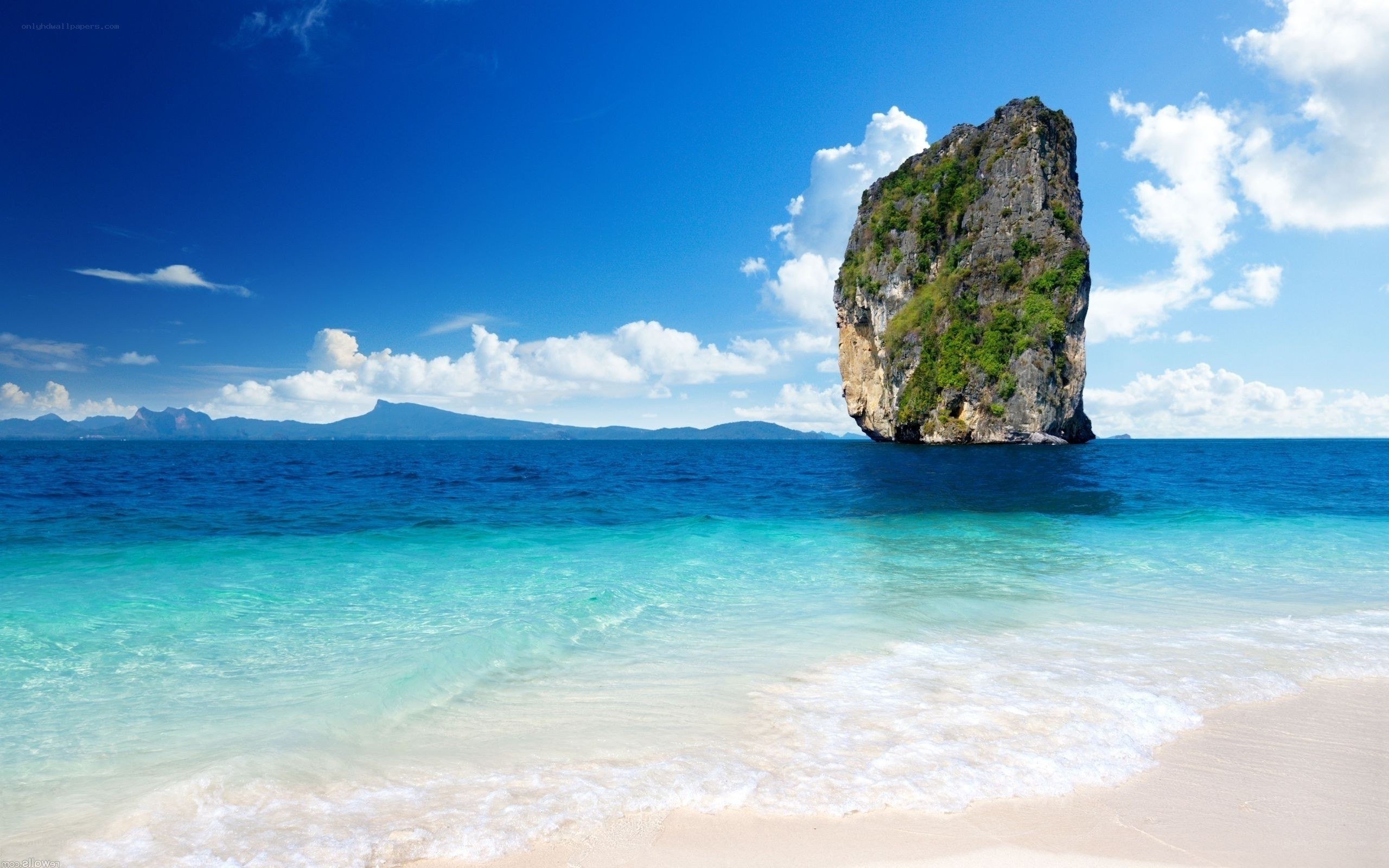 tropical beach with rock formation