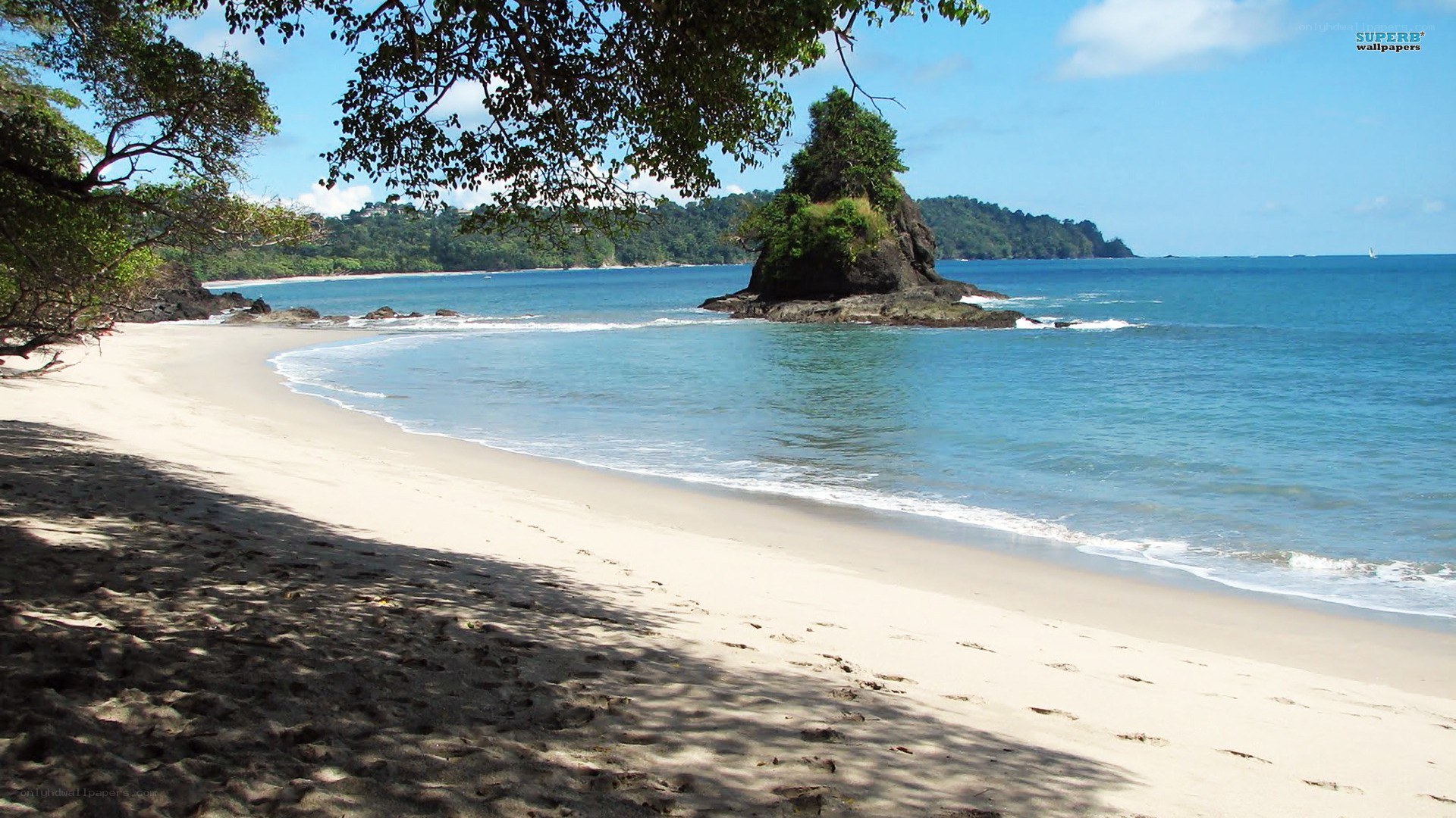 tropical beach with rock formation