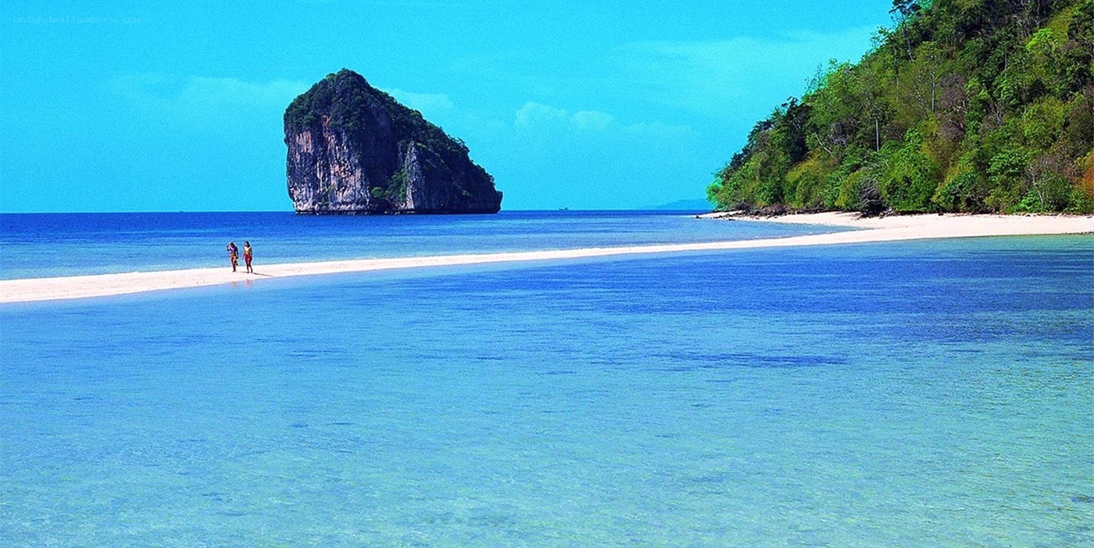 tropical beach with rock formation