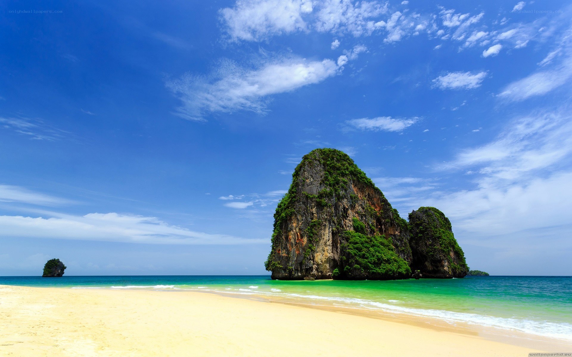 tropical beach with rock formations