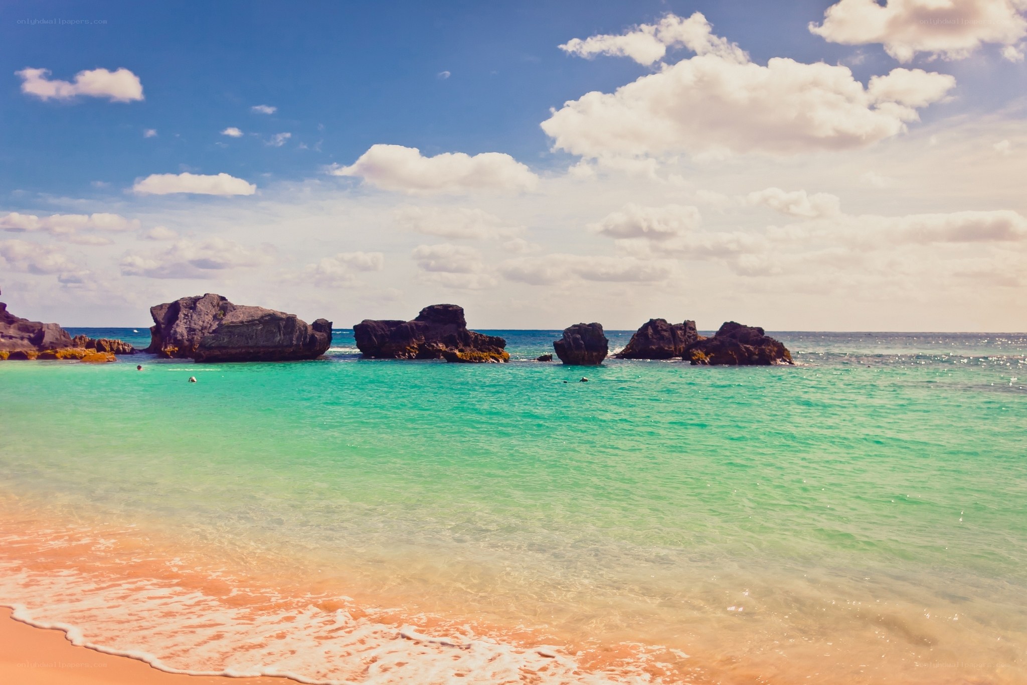 tropical beach with rock formations