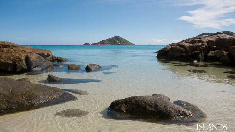 Tropical Beach with Rocks — Blue, Serene, Afternoon, Photograph, Island