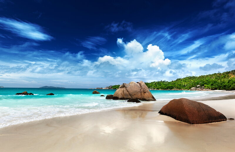 Tropical Beach with Rocks — Blue, Serene, Afternoon, Photograph, Ocean, Sky, Trees