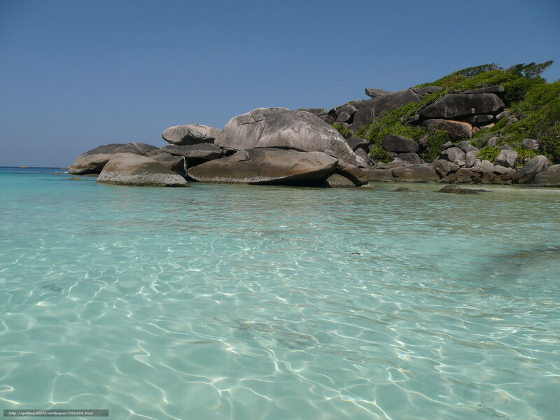 Tropical Beach with Rocks — Blue, Serene, Afternoon, Photograph, Ocean, Sky, Vegetation