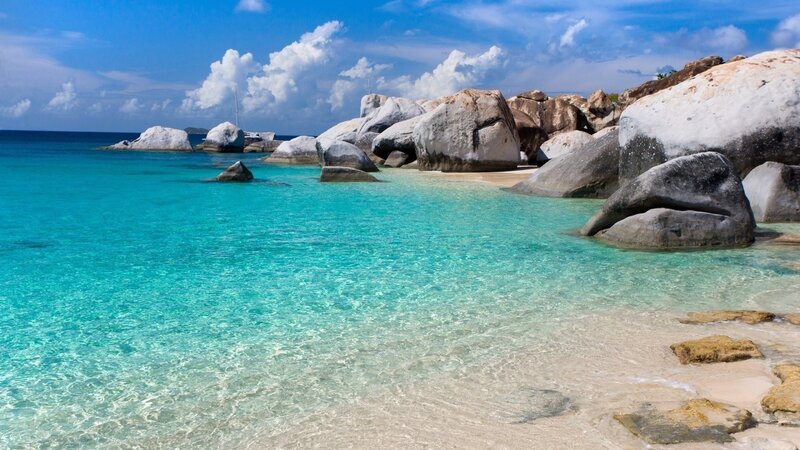 Tropical Beach with Rocks — Blue, Serene, Afternoon, Photograph, Ocean, Sky, White