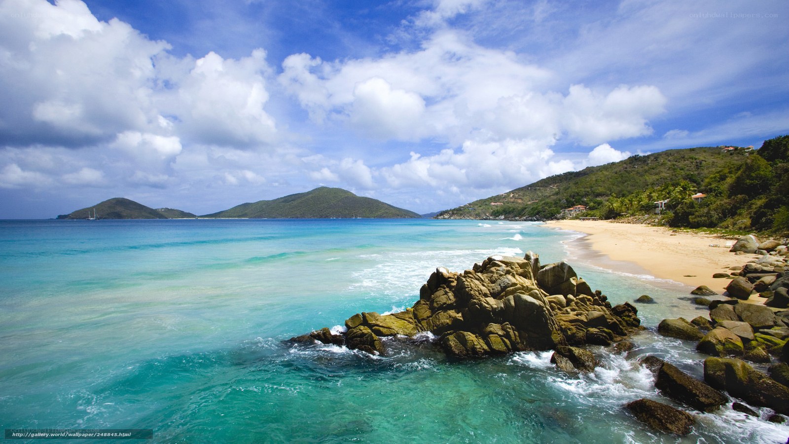tropical beach with rocky shore