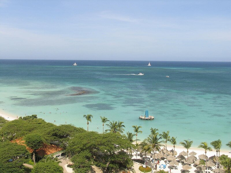 Tropical Beach with Sailboats — Blue