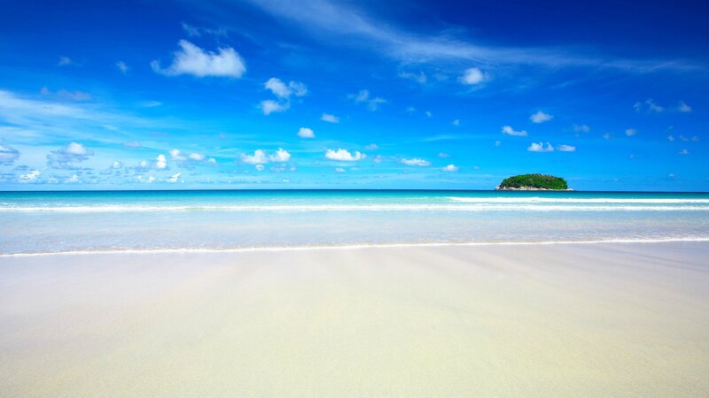 tropical beach with small island