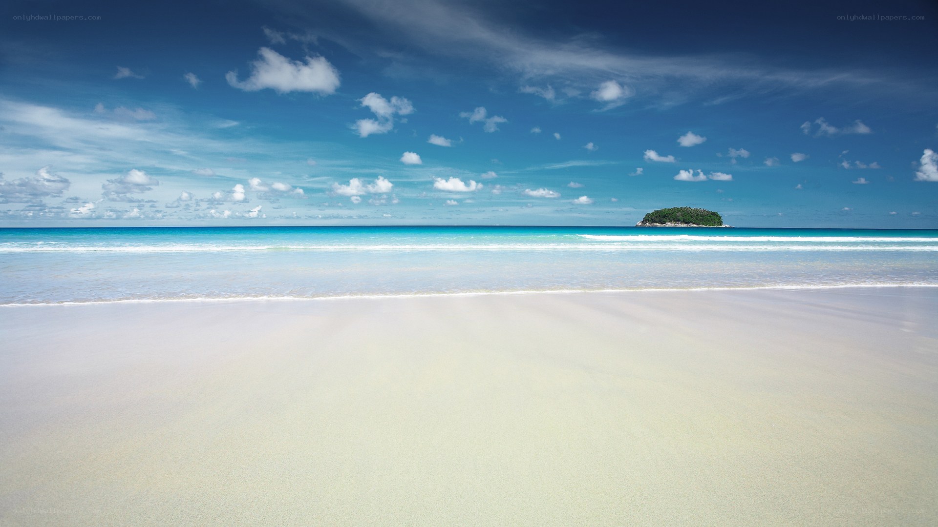 Tropical beach with small island