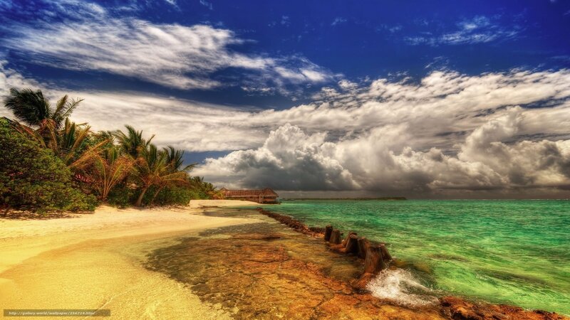 Tropical beach with storm clouds