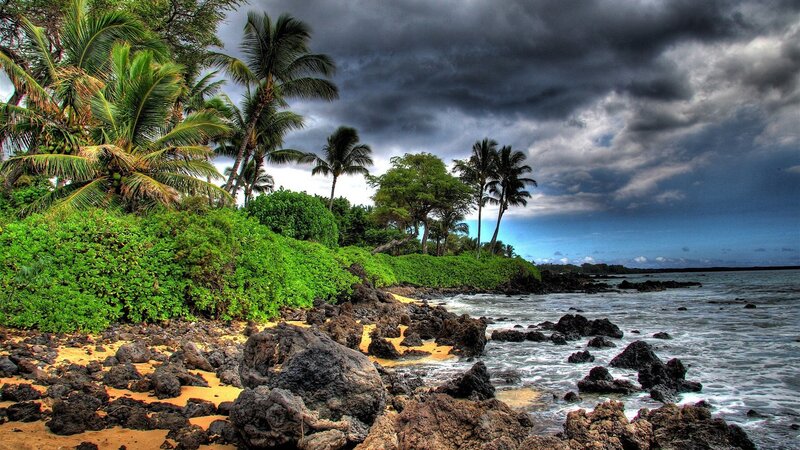 tropical beach with storm clouds