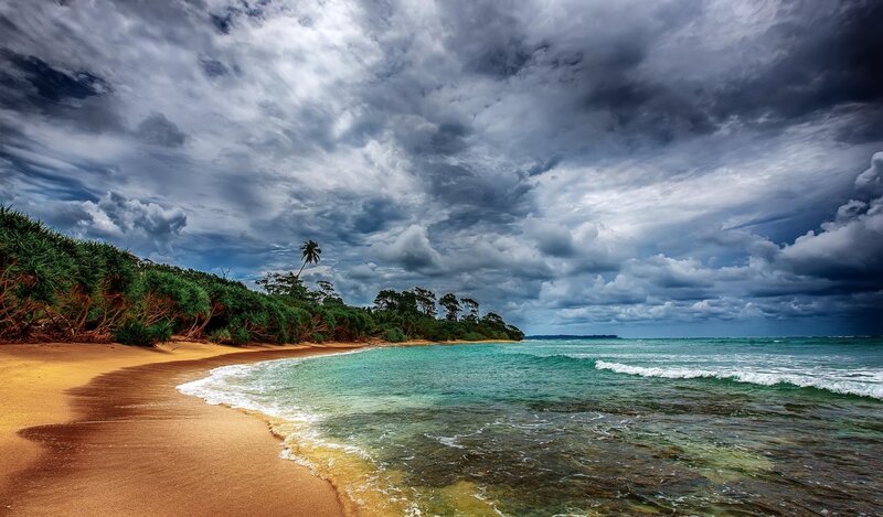 Tropical Beach with Storm Clouds — Blue
