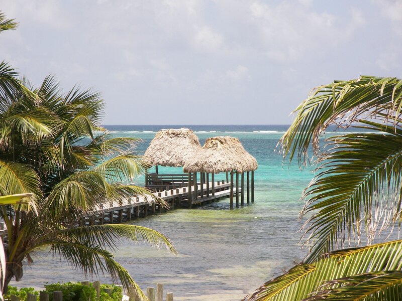 Tropical beach with thatched huts