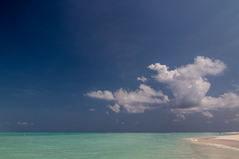 Tropical Beach with Turquoise Water — Blue, Serene, Afternoon, Photograph, Clouds
