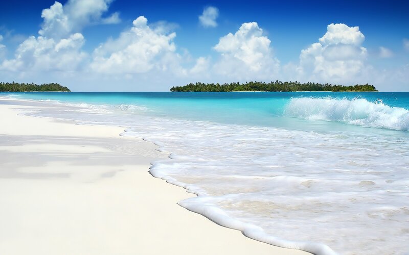 Tropical Beach with Waves — Blue, Serene, Afternoon, Photograph, Island, Palm Trees, Clouds