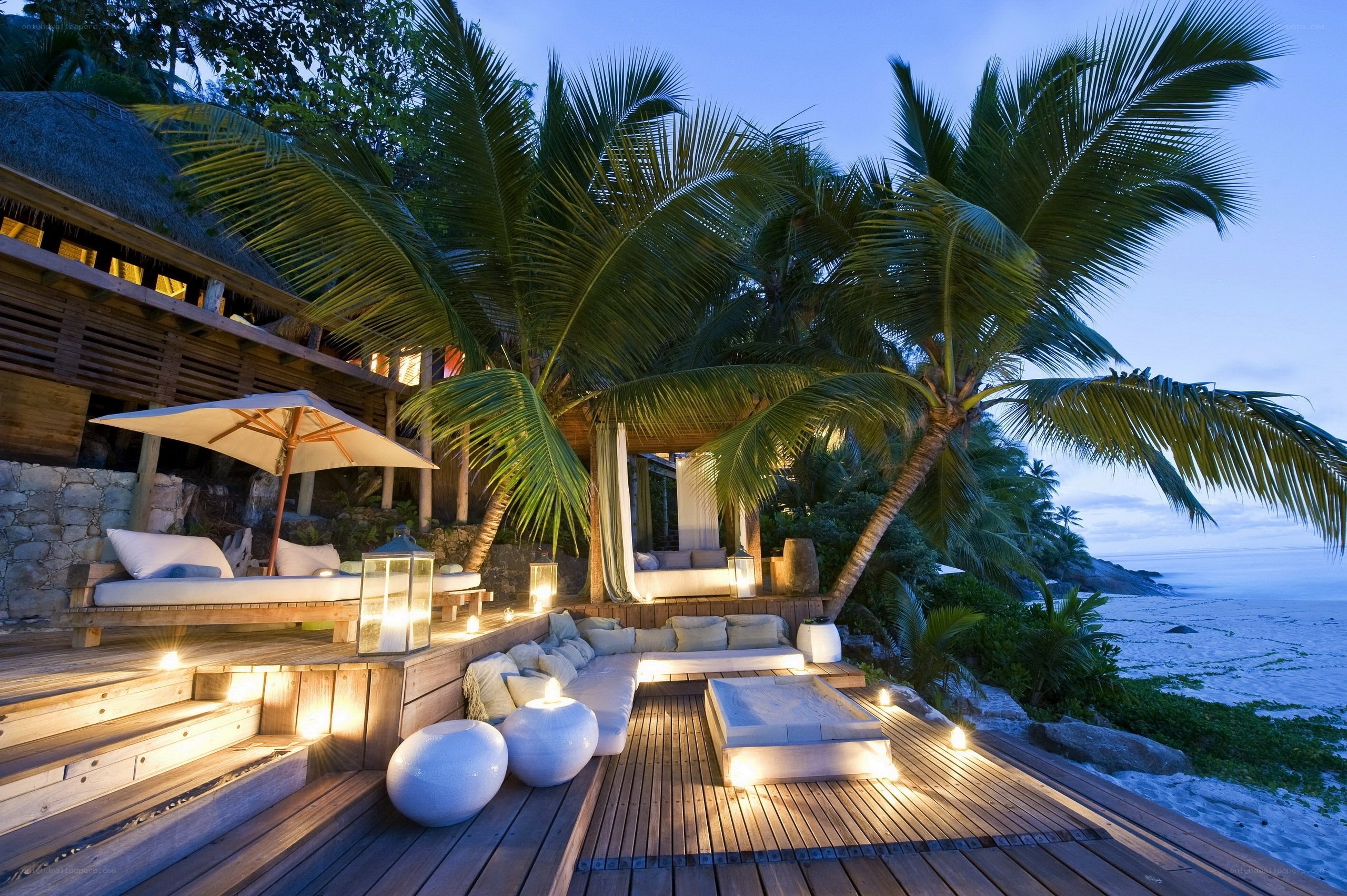 Tropical beachside lounge at dusk