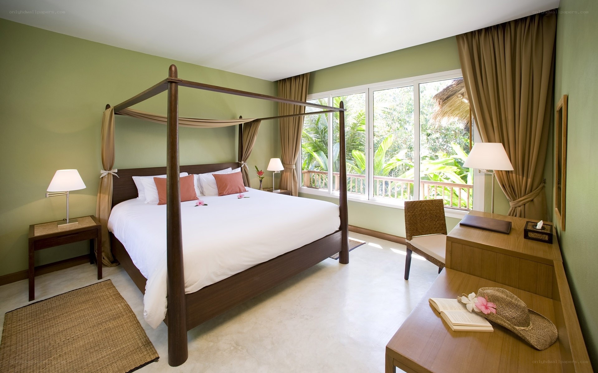 Tropical bedroom with four-poster bed