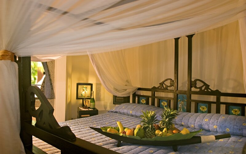 Tropical bedroom with fruit platter