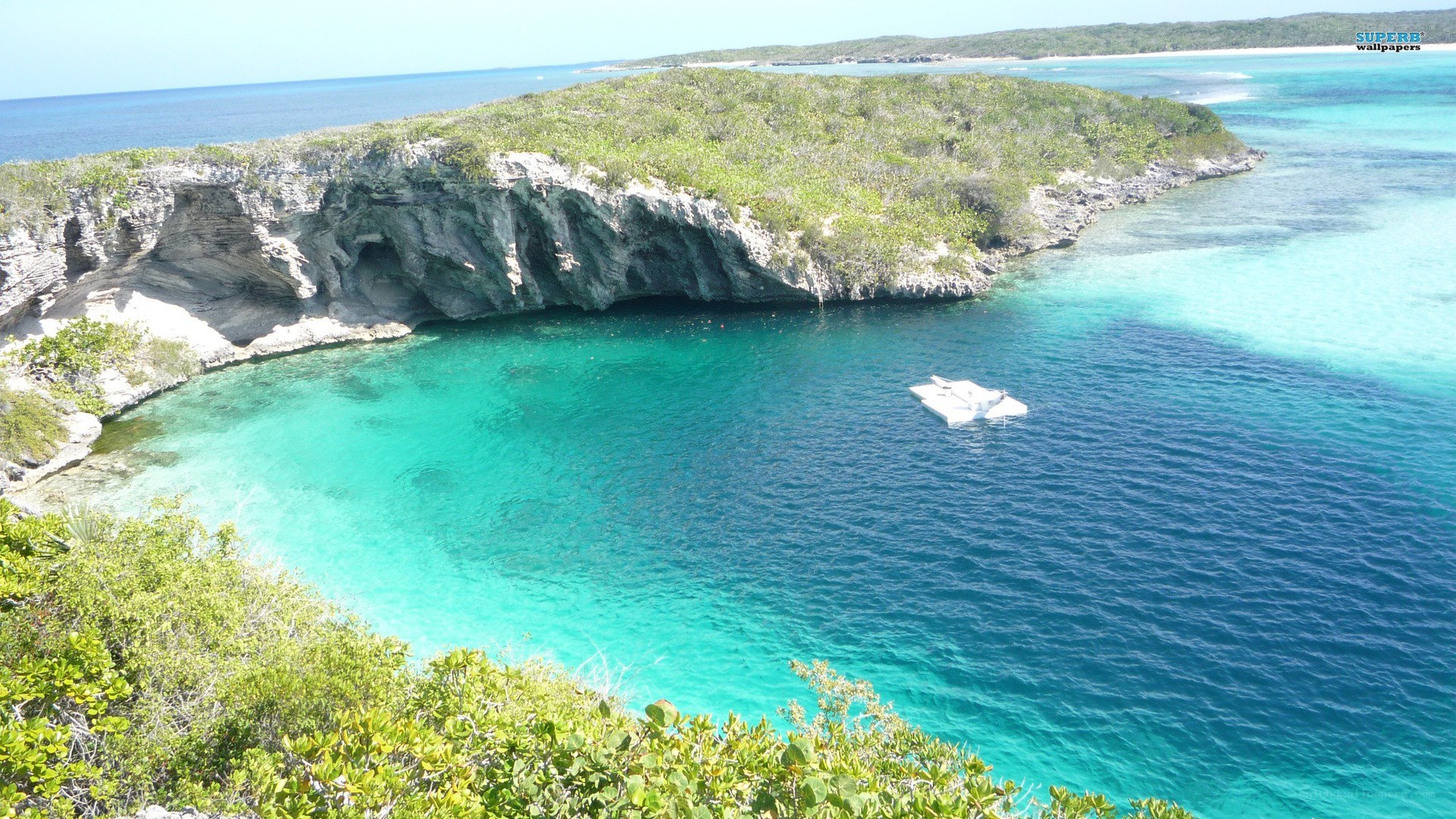 tropical cove with boat