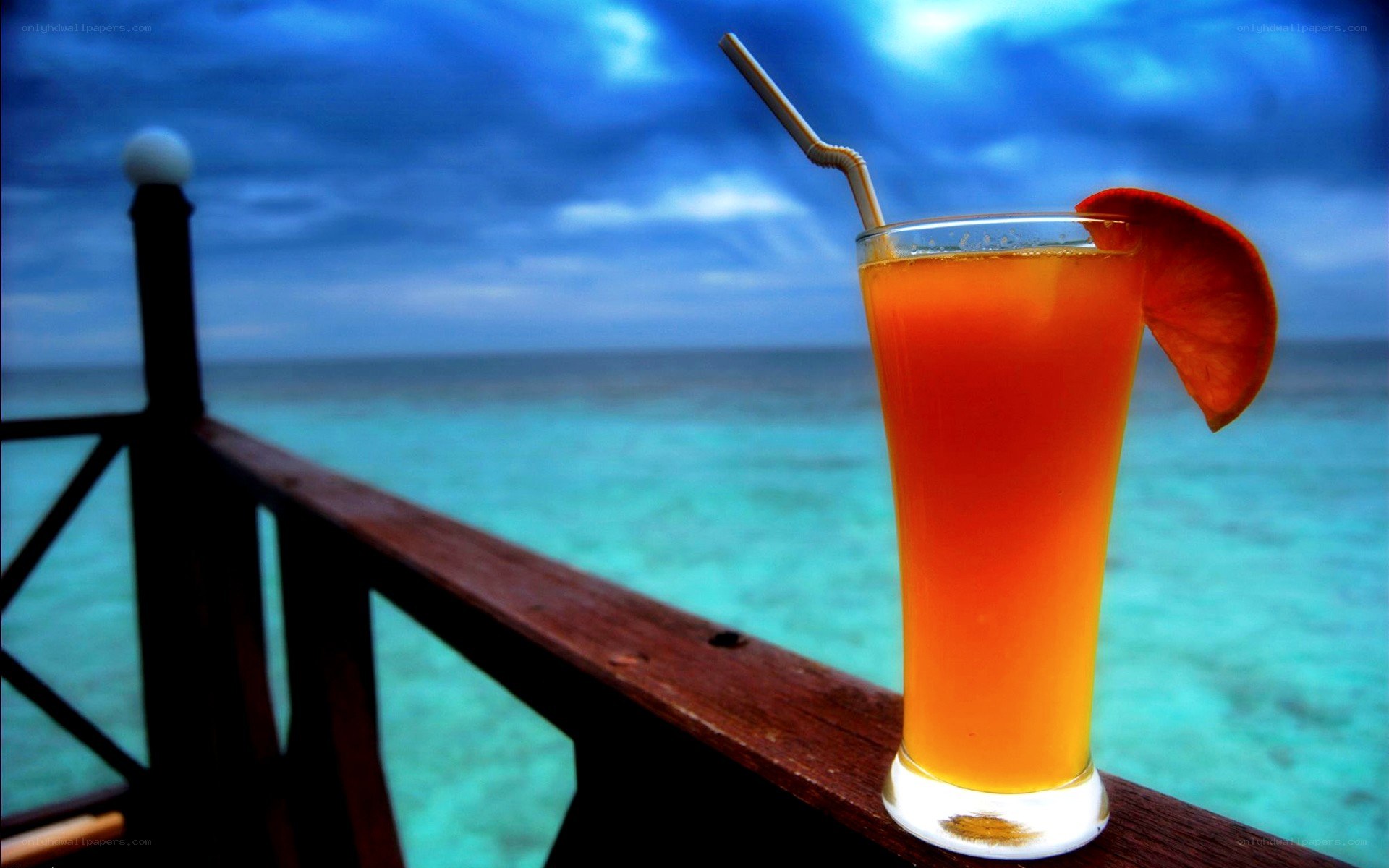 tropical drink on a pier