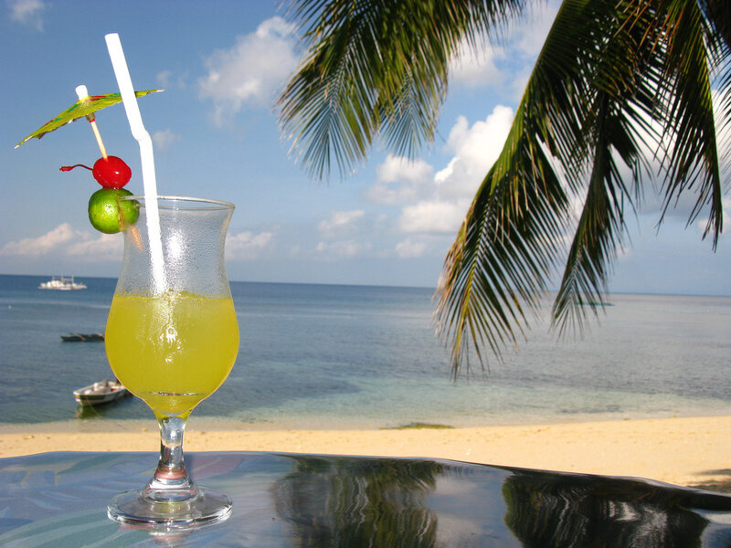 Tropical Drink on Beach — Yellow, Relaxed, Afternoon, Photograph, Palm Tree