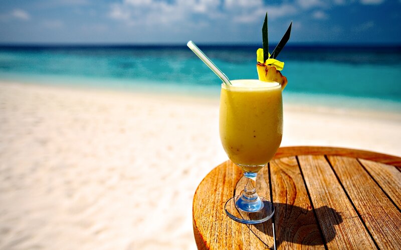 Tropical Drink on Beach — Yellow, Relaxed